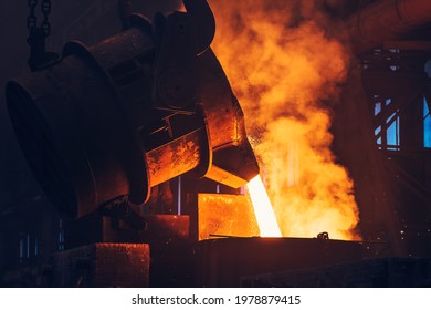 Liquid Iron Molten Metal Pouring From Ladle Container Into Mold, Industrial Metallurgical Factory, Foundry Cast, Heavy Industry Background