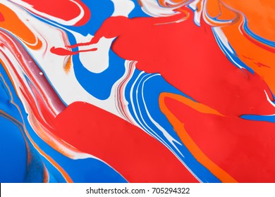 Liquid Marbling Paint Background. Fluid Painting Abstract Texture. Colorful Mix Of Acrylic Vibrant Colors.