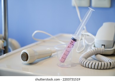 Liquid Medicine In A Cup With The Patient's Oral Syringe,water Pills For Children,Press The Emergency Button To Call The Nurse In A Hospital Emergency.
