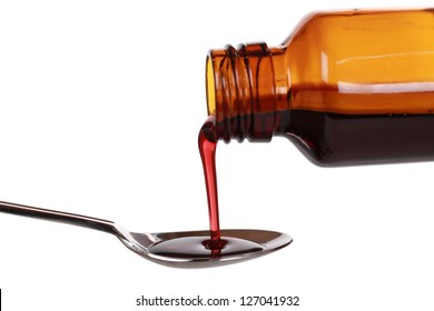 Liquid Medicine Pouring From A Bottle On A Spoon