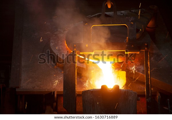 Liquid Molten\
Steel Industry. Hot metal\
casting.