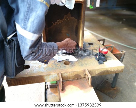 Liquid penetrant test for welding joint root pass and cover pass of H-beam column to base plate