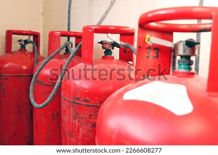 liquid petroleum gas (LPG) cylinders stored in a chamber