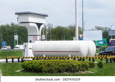 Liquid propane gas station. Black modern SUV car refueling tank with alternative power natural liquefied fuel