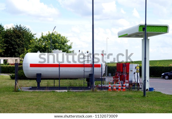 Liquid propane gas station. LPG station for filling\
liquefied propane gas into the vehicle tanks. Environmentally\
friendly fuel.