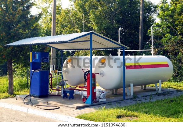 Liquid propane gas station. LPG station for filling\
liquefied propane gas into the vehicle tanks. Environmentally\
friendly fuel.