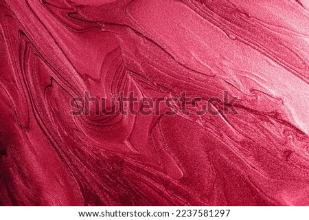 Liquid shimmer background,monochrome red trendy color of 2023.
