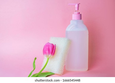 Liquid soap for women with a dispenser on a pink background. cleanser concept. Means for intimate hygiene. Gentle environmentally friendly beauty product for women