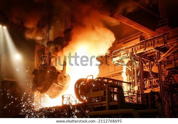 Liquid steel\
is poured from a metallurgical\
ladle