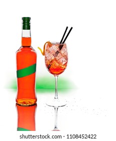 A Liquor Bottle And A Cup Of Spritz. Cold Cocktail Typical At Italian Aperitivo Or Apericena On White Background.