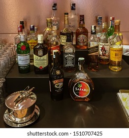 Liquor Cabinet Filled With Various High End Alcoholic Drinks.