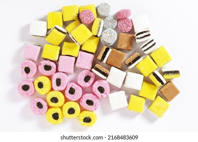 Liquorice allsorts candy on a white background, top view