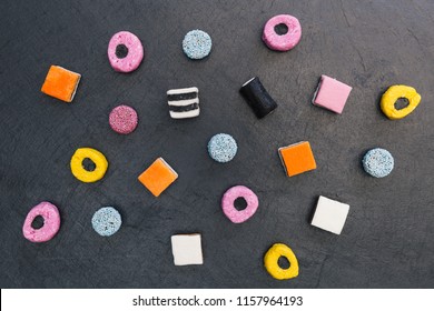 Liquorice allsorts candy sweets on dark background