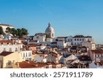 Lisbon city in Portugal, cityscape of Alfama district and dome of the National Pantheon (Santa Engracia church).