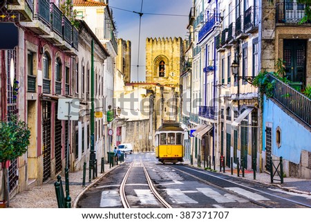 Lisbon, Porgugal cityscape and tram near Lisbon Cathedral.