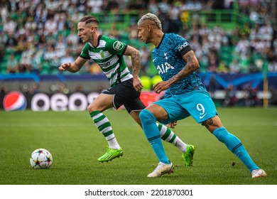 Lisbon, Portugal - 09 13 2022: UEFA Champions League Game Between Sporting CP And Tottenham Hotspur F.C; Nuno Santos Dribbles Through Richarlison