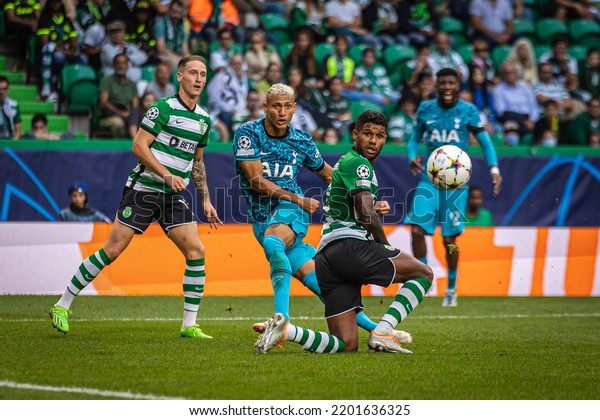 Lisbon, Portugal - 09 13 2022: UEFA Champions League\
game between Sporting CP and Tottenham Hotspur F.C; Richarlison\
shoots guarded by Matheus\
Reis