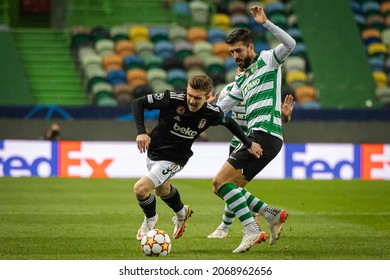 Lisbon, Portugal - 11 03 2021 - UEFA Champions League - Sporting CP Besiktas JK, Paulinho Fighting For Ball With Ridvan Yilmaz