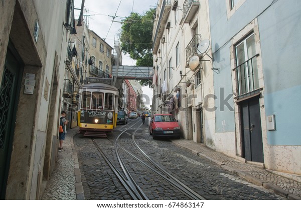 Lisbon, Portugal - 2016: Lisbon everyday life. The\
famous tram 28.