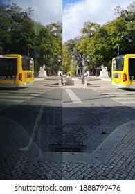 Lisbon, Portugal - 30 November 2020 : Reflection Of A Yellow Bus Near Cais Do Sodré