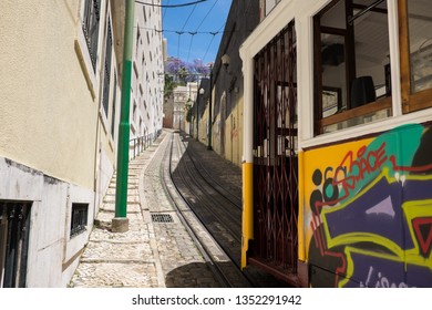 Lisbon, Portugal – 5/20/2017: One Of The Most Famous And Historical Electric Tram (elevator/fift) Running On The Fancy Street