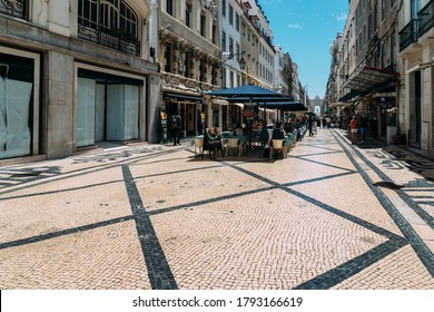 Lisbon, Portugal. August 9, 2020: Almost Deserted Augusta Street In Baixa, Lisbon, Portugal During The Coronavirus Covid-19 Outbreak As Many Tourists Decide To Stay At Home