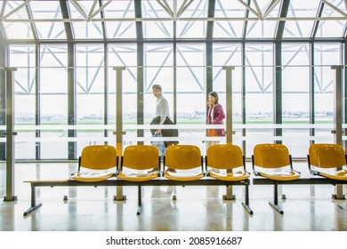 Lisbon, Portugal - December 30, 2008: Passengers Are Hurrying To The Gate At The Airport, Glass Wall With Free View To The Apron