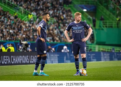 Lisbon, Portugal, Estadio Jose Alvalade - 02 15 2022: Champions League Best of 16 - Sporting CP - Manchester City; Kevin De Bruyne and Ryiad Mahrez before a free kick