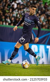 Lisbon, Portugal, Estadio Jose Alvalade - 02 15 2022: Champions League Best of 16 - Sporting CP - Manchester City; Joao Cancelo controlling the ball