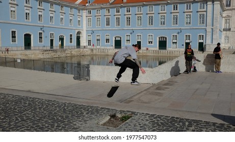 LISBON, PORTUGAL - Feb 23, 2019: Skateboarder In Lisbon Making A Kick Flip Trick