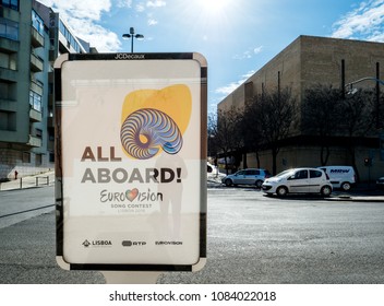 LISBON, PORTUGAL - FEB 8, 2018: All Abroad Message For The Eurovision Song Contest 2018 In Lisbon As Seen In On The Outdoor Ooh Banner Advertising Jcdecaux Central Lisbon Street With Cars 