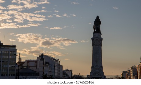 Lisbon, Portugal - January, 10 2021: Marquês De Pombal Statue And Square With Sunrise On The Background