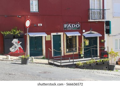 LISBON, PORTUGAL - January 19, 2017. Typical Fado Bar Restaurant In Rustic Alfama Neighborhood Street With Food, Drinks And Entertainment Of Traditional Live Fado Music. Urban Lifestyle, Trendy City.