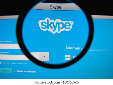 LISBON, PORTUGAL - MARCH 10, 2014: Photo of Skype homepage on a monitor screen through a magnifying glass.