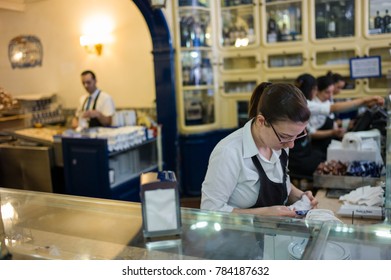 Lisbon, Portugal - May 24 2016: The signature custard tart sold in the famous restaurant Pasteis de Belem. - Shutterstock ID 784187632