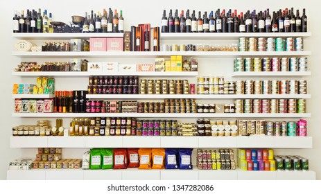 Lisbon, Portugal - Nov 26, 2009. Photo Of A Shelf Filled With Gourmet Food And Drink Items For Sale Inside The Old Quinoa Shop. This Shop Is Now Permanently Closed And Replaced By Another Business.