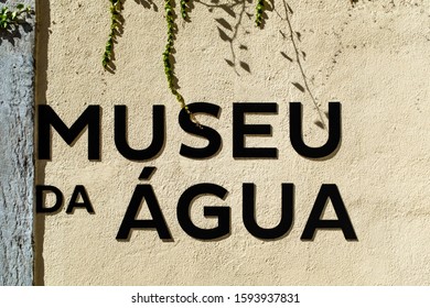 LISBON, PORTUGAL - OCTOBER 10, 2019: Black Letters Forming Name Of Water Museum Near Entrance To The Águas Livres Aqueduct.