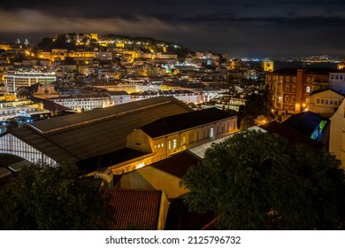 Lisbon, Portugal - October 27, 2020: Night View Of Lisbon, The Capital And The Largest City Of Portugal, City Lights, Clouds And Fog In Lisbon, Portugal, On October 27th, 2020