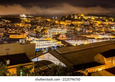 Lisbon, Portugal - October 27, 2020: Night View Of Lisbon, The Capital And The Largest City Of Portugal, City Lights, Clouds And Fog In Lisbon, Portugal, On October 27th, 2020