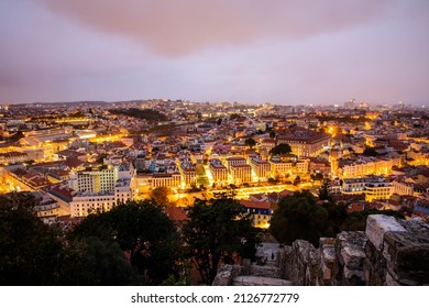 Lisbon, Portugal - October 27, 2020: Night View Of Lisbon, The Capital And The Largest City Of Portugal, City Lights, Clouds And Fog In Lisbon, Portugal, On October 27th, 2020