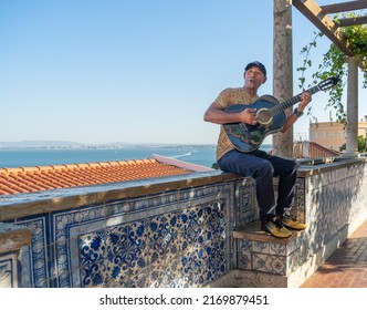 Lisbon, Portugal, September 03, 2020, A Humble Man Plays The Guitar In The Street