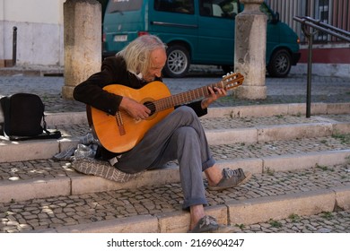 Lisbon, Portugal, September 04, 2020, Humble Man Plays The Guitar In The Street