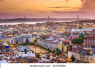 Lisbon, Portugal Skyline At Sunset.