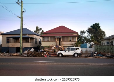 Lismore, New South Wales, Australia; 22.03.2022: Residential Houses With Severe Water Damage And Piles Of Garbage By The Roadside After The 2022 East Coast Floods In Australia