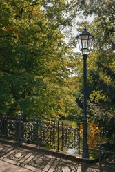 Listed "Schwanenbrücke" ("Swan Bridge") With Lantern And Ornamental Railing At The Listed "Lennépark" Public Garden In Frankfurt (Oder)