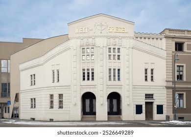 The listed "Weltspiegel" cinema in Cottbus is one of the oldest German movie theatres which ist still in use - inscriptions and graffiti daubs partly removed - Powered by Shutterstock