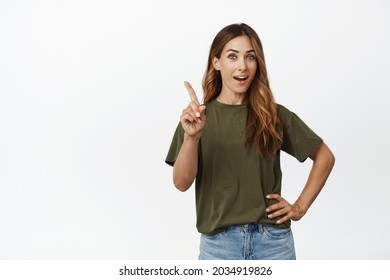 Listen Up. Adult Beautiful Woman Shaking Finger In Disapproval, Tell Rule, Stop Taboo Sign, Scolding Something Bad, Teaching A Lesson, Standing In Tshirt Against White Background.