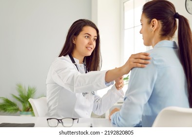 Listen, You're Gonna Be Okay. Supportive Doctor Talking To Patient. Friendly Physician Or Gynaecologist Reassuring Young Woman During Medical Consultation At Her Office. Female Health Checkup