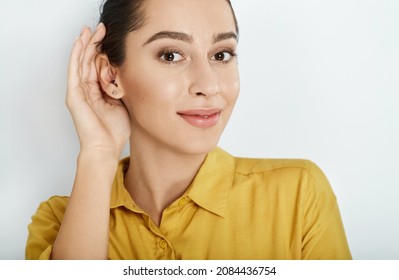 Listening Woman With Hand Near Ear For Hearing Check-up. Hearing Test Concept