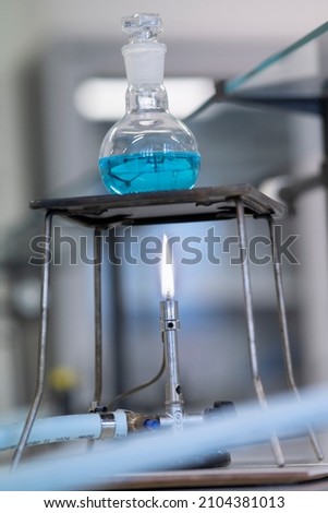 Lit bunsen in the chemistry laboratory